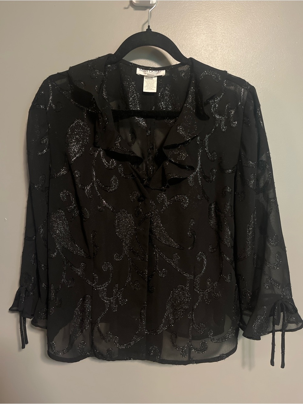 Miss Dorby Black Sheer Ruffle Blouse with Glitter Swirl